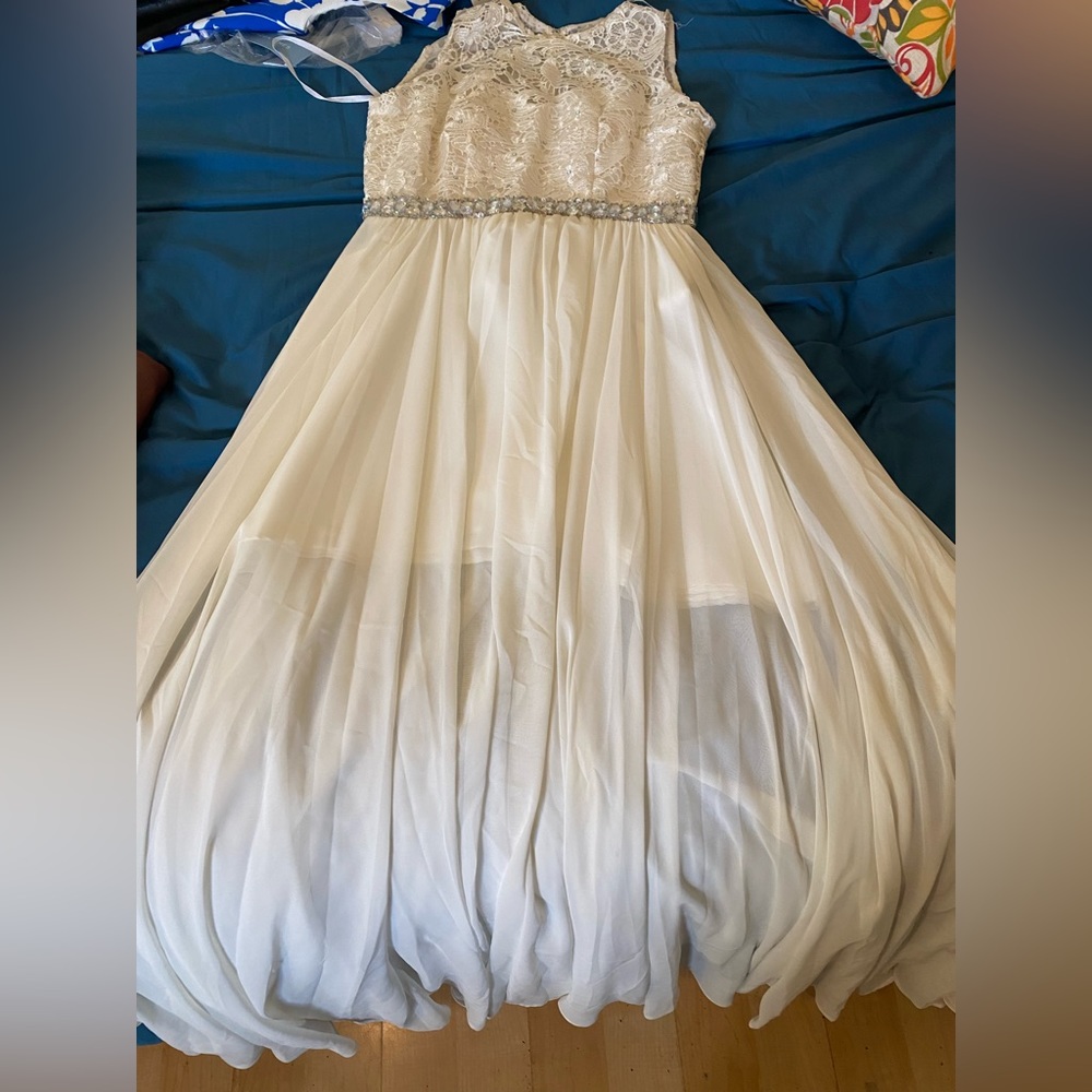 Dress.  Dressy elegant tight fit on top loose fit bottom (puffy) knee high